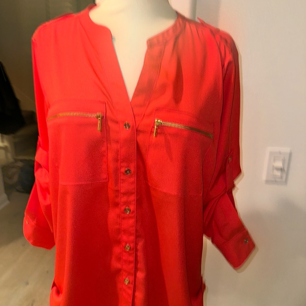 Calvin Klein — A Reddish/Tangerine colored Blouse with Gold Zipper Accents